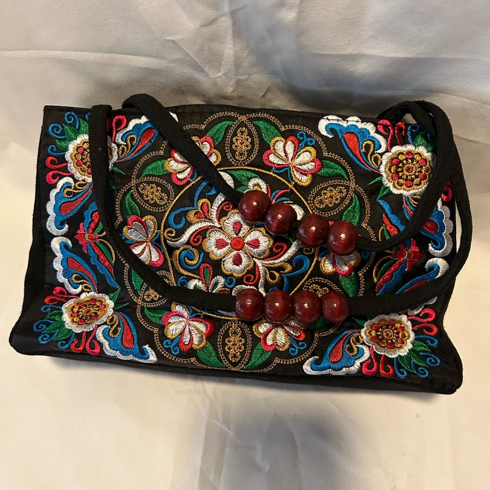New without tag, cloth embroidered hand bag. No brand